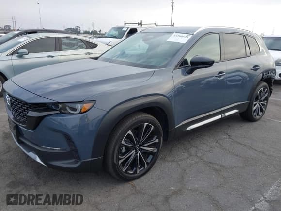 ✅ 2025 Mazda CX-50 Premium Plus • VIN: 7MMVABEY4SN323289 • Lot: 43280523. Listed on IAAI with 8,571 mi. Free auction sales archive from the USA and detailed vehicle history report at DreamBid. Image 23.
