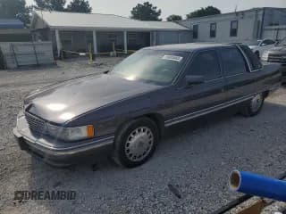 ✅ 1996 Cadillac DeVille • VIN: 1G6KD52YXTU239648 • Lot: 59805465. Listed on Copart with 137,482 mi. Free auction sales archive from the USA and detailed vehicle history report at DreamBid. Image 1.