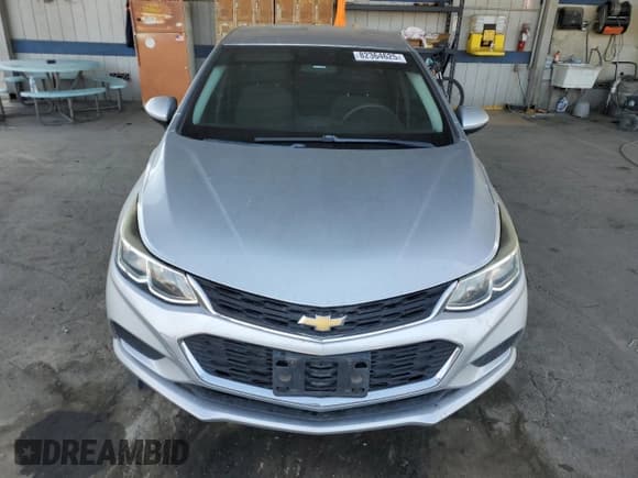 ✅ 2018 Chevrolet Cruze LS • VIN: 1G1BC5SM7J7134731 • Lot: 82364625. Listed on Copart with 84,754 mi. Free auction sales archive from the USA and detailed vehicle history report at DreamBid. Image 5.
