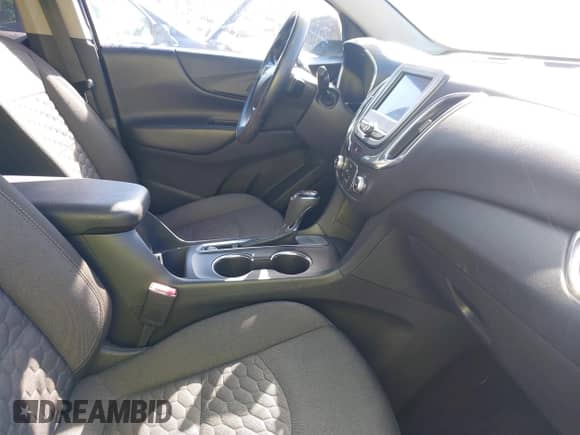 2020 Chevrolet Equinox LT z VIN 3GNAXKEV7LS598821, wystawiony jako IAAI lot #43088697 z przebiegiem 49 107 mil mil oraz . Historia ofert i sprzedaży dostępna na DreamBid. Obrazek 5.