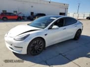 ✅ 2021 Tesla Model 3 Performance • VIN: 5YJ3E1EC7MF001211 • Lot: 84995295. Listed on Copart with 104,922 mi. Free auction sales archive from the USA and detailed vehicle history report at DreamBid. Image 1.