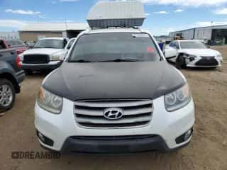 2012 Hyundai Santa Fe SE с VIN 5XYZHDAG7CG099546, выставлен на аукционе Copart как лот 71553834 с пробегом Не указан миль и Списание • Salvage title. История ставок и продаж доступна на DreamBid. Изображение 5.