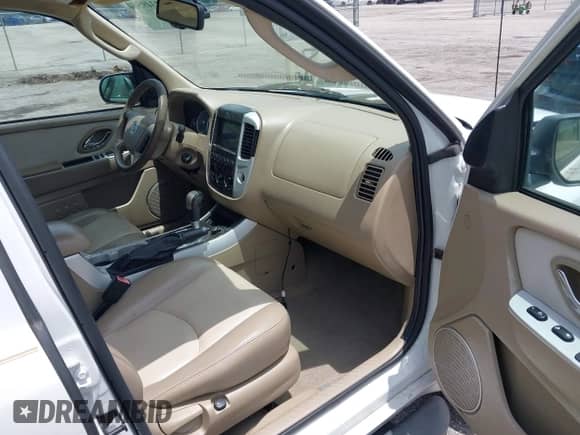 2006 Mercury Mariner Luxury с VIN 4M2YU56116KJ14472, выставлен на аукционе IAAI как лот 42349564 с пробегом 96 221 миль миль и . История ставок и продаж доступна на DreamBid. Изображение 5.