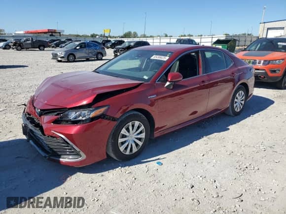 2021 Toyota Camry Hybrid LE with VIN 4T1C31AK1MU559738, listed as a Copart auction lot 85496625 with 27,669 mi miles and Salvage title. Bid and sale history available at DreamBid. Image 1.