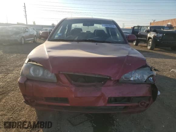 2004 Hyundai Elantra GLS z VIN KMHDN46D44U901502, wystawiony jako Copart lot #74850854 z przebiegiem 80 940 mil mil oraz Szkoda całkowita • Salvage title. Historia ofert i sprzedaży dostępna na DreamBid. Obrazek 5.
