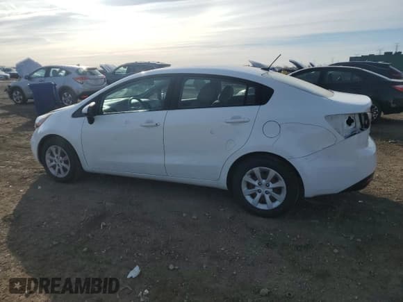 ✅ 2014 Kia Rio LX • VIN: KNADM4A39E6395299 • Lot: 92594225. Wystawiony na Copart z przebiegiem 106 842 mil. Bezpłatny archiwum sprzedaży aukcyjnych z USA i szczegółowy raport historii pojazdu na DreamBid. Zdjęcie 2.