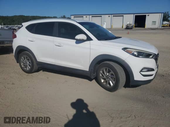 2016 Hyundai Tucson Sport with VIN KM8J33A26GU242125, listed as a Copart auction lot 82364965 with 101,227 mi miles and Clean title. Bid and sale history available at DreamBid. Image 4.
