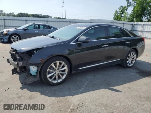 ✅ 2014 Cadillac XTS Luxury • VIN: 2G61M5S38E9132386 • Lot: 57744985. Listed on Copart with 130,940 mi. Free auction sales archive from the USA and detailed vehicle history report at DreamBid. Image 1.