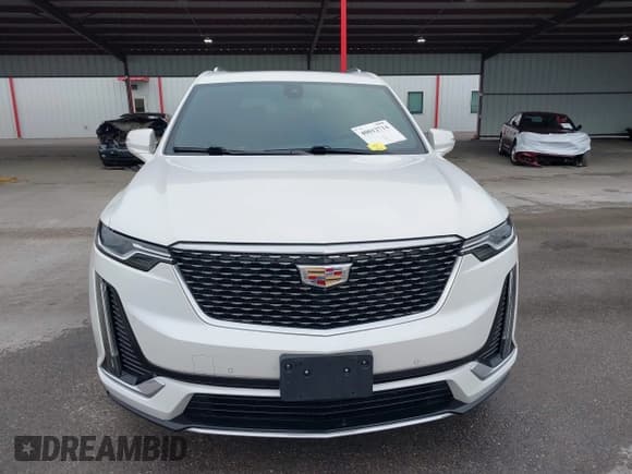 ✅ 2021 Cadillac XT6 Premium Luxury • VIN: 1GYKPCRS8MZ233209 • Lot: 40012714. Listed on IAAI with 45,599 mi. Free auction sales archive from the USA and detailed vehicle history report at DreamBid. Image 12.