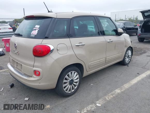 ✅ 2014 FIAT 500L Easy • VIN: ZFBCFABH1EZ012569 • Лот: 43310355. Опубликован ранее на IAAI с пробегом 128 566 миль. Бесплатный доступ к архиву аукционных продаж из США и подробный отчёт об истории автомобиля на DreamBid. Изображение 4.