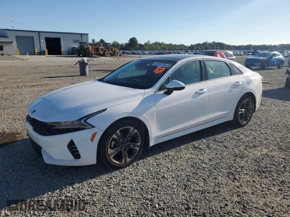 ✅ 2021 Kia K5 EX • VIN: 5XXG34J25MG033688 • Лот: 82343775. Опубликован ранее на Copart с пробегом 70 403 миль. Бесплатный доступ к архиву аукционных продаж из США и подробный отчёт об истории автомобиля на DreamBid. Изображение 1.