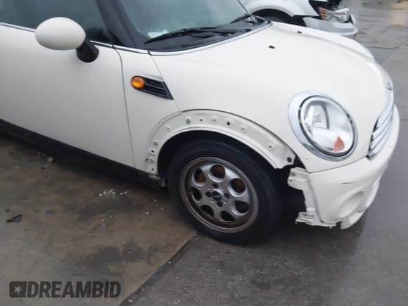 ✅ 2012 MINI Hardtop • VIN: WMWSU3C52CT261877 • Lot: 43799254. Listed on IAAI with 101,341 mi. Free auction sales archive from the USA and detailed vehicle history report at DreamBid. Image 12.