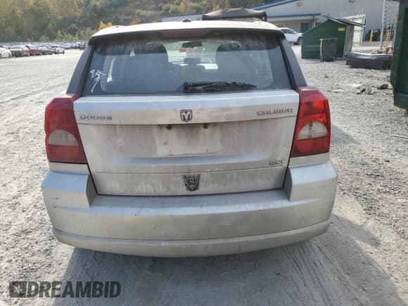 2010 Dodge Caliber SXT с VIN 1B3CB4HA6AD632590, выставлен на аукционе Copart как лот 75929634 с пробегом 213 273 миль миль и Списание • Salvage title. История ставок и продаж доступна на DreamBid. Изображение 6.