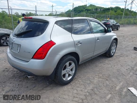 ✅ 2003 Nissan Murano SE • VIN: JN8AZ08W43W214000 • Lot: 42274384. Wystawiony na IAAI z przebiegiem 98 927 mil. Bezpłatny archiwum sprzedaży aukcyjnych z USA i szczegółowy raport historii pojazdu na DreamBid. Zdjęcie 4.