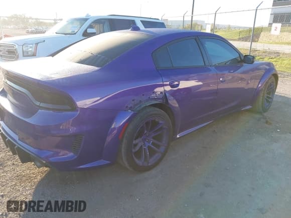 ✅ 2023 Dodge Charger Scat Pack Widebody • VIN: 2C3CDXGJ3PH624989 • Lot: 43398270. Listed on IAAI with 42,494 mi. Free auction sales archive from the USA and detailed vehicle history report at DreamBid. Image 4.
