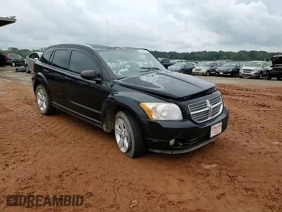 2012 Dodge Caliber SXT с VIN 1C3CDWDA6CD532698, выставлен на аукционе Copart как лот 73548874 с пробегом 109 422 миль миль и Списание • Salvage title. История ставок и продаж доступна на DreamBid. Изображение 11.