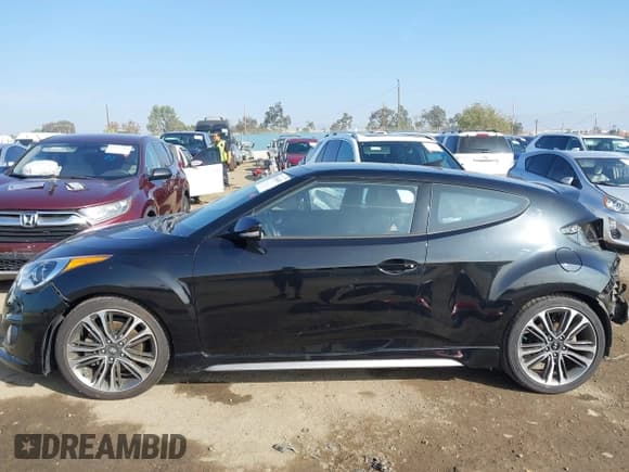 ✅ 2016 Hyundai Veloster Turbo Rally Edition • VIN: KMHTC6AE9GU262731 • Лот: 43566681. Опубликован ранее на IAAI с пробегом 72 683 миль. Бесплатный доступ к архиву аукционных продаж из США и подробный отчёт об истории автомобиля на DreamBid. Изображение 14.