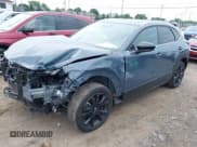 ✅ 2022 Mazda CX-30 S Carbon Edition • VIN: 3MVDMBCL7NM434765 • Lot: 42689789. Listed on IAAI with 27,767 mi. Free auction sales archive from the USA and detailed vehicle history report at DreamBid. Image 2.