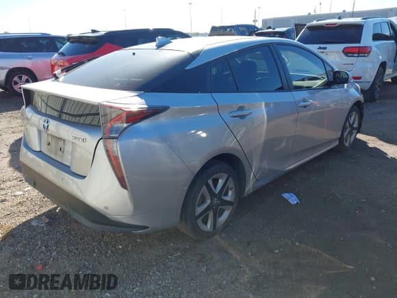 ✅ 2018 Toyota Prius Three • VIN: JTDKARFU6J3059235 • Lot: 43549408. Listed on IAAI with 44,628 mi. Free auction sales archive from the USA and detailed vehicle history report at DreamBid. Image 4.
