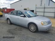 ✅ 2005 Mercury Montego Premier • VIN: 1MEFM42175G603066 • Lot: 51176974. Listed on Copart with 172,759 mi. Free auction sales archive from the USA and detailed vehicle history report at DreamBid. Image 4.