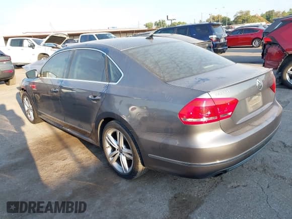 ✅ 2014 Volkswagen Passat SEL Premium • VIN: 1VWCS7A38EC010397 • Lot: 43381641. Listed on IAAI with 137,277 mi. Free auction sales archive from the USA and detailed vehicle history report at DreamBid. Image 3.