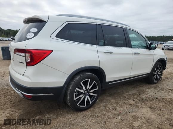 ✅ 2019 Honda Pilot Touring 8-Passenger • VIN: 5FNYF5H91KB018111 • Lot: 71864465. Listed on Copart with 96,937 mi. Free auction sales archive from the USA and detailed vehicle history report at DreamBid. Image 3.