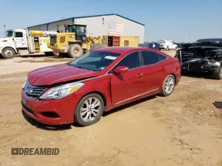 ✅ 2013 Hyundai Azera • VIN: KMHFG4JG5DA224594 • Лот: 59870195. Опубликован ранее на Copart с пробегом 124 316 миль. Бесплатный доступ к архиву аукционных продаж из США и подробный отчёт об истории автомобиля на DreamBid. Изображение 1.