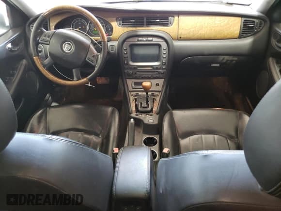 ✅ 2005 Jaguar X-Type 3.0L • VIN: SAJWA54A05WE48092 • Лот: 53039865. Опубликован ранее на Copart с пробегом 143 899 миль. Бесплатный доступ к архиву аукционных продаж из США и подробный отчёт об истории автомобиля на DreamBid. Изображение 8.