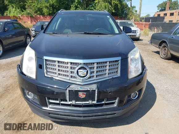 ✅ 2013 Cadillac SRX Performance Collection • VIN: 3GYFNHE37DS638638 • Lot: 43173381. Listed on IAAI with 156,214 mi. Free auction sales archive from the USA and detailed vehicle history report at DreamBid. Image 6.