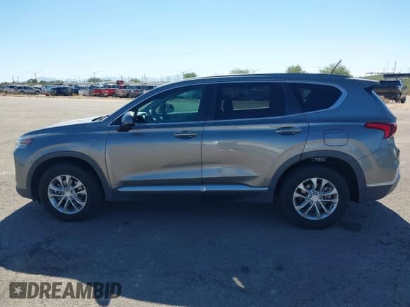 ✅ 2019 Hyundai Santa Fe SE • VIN: 5NMS23AD8KH030713 • Lot: 43592667. Wystawiony na IAAI z przebiegiem 74 344 mil. Bezpłatny archiwum sprzedaży aukcyjnych z USA i szczegółowy raport historii pojazdu na DreamBid. Zdjęcie 14.