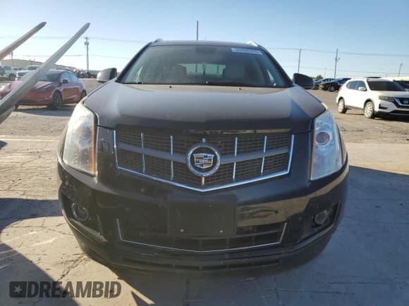 ✅ 2012 Cadillac SRX Performance Collection • VIN: 3GYFNBE33CS646165 • Lot: 90860355. Wystawiony na Copart z przebiegiem 157 539 mil. Bezpłatny archiwum sprzedaży aukcyjnych z USA i szczegółowy raport historii pojazdu na DreamBid. Zdjęcie 5.