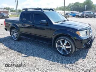 ✅ 2013 Nissan Frontier SV • VIN: 1N6AD0EV8DN734260 • Lot: 43006357. Listed on IAAI with 132,599 mi. Free auction sales archive from the USA and detailed vehicle history report at DreamBid. Image 1.