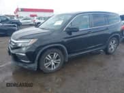 ✅ 2017 Honda Pilot EX-L • VIN: 5FNYF5H58HB000744 • Lot: 43743519. Listed on IAAI with 215,380 mi. Free auction sales archive from the USA and detailed vehicle history report at DreamBid. Image 2.