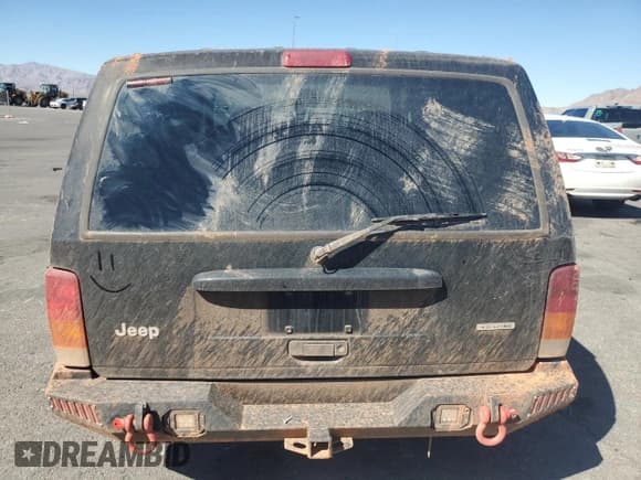 ✅ 2000 Jeep Cherokee • VIN: 1J4FF48S6YL166145 • Lot: 85129215. Wystawiony na Copart z przebiegiem 186 626 mil. Bezpłatny archiwum sprzedaży aukcyjnych z USA i szczegółowy raport historii pojazdu na DreamBid. Zdjęcie 6.