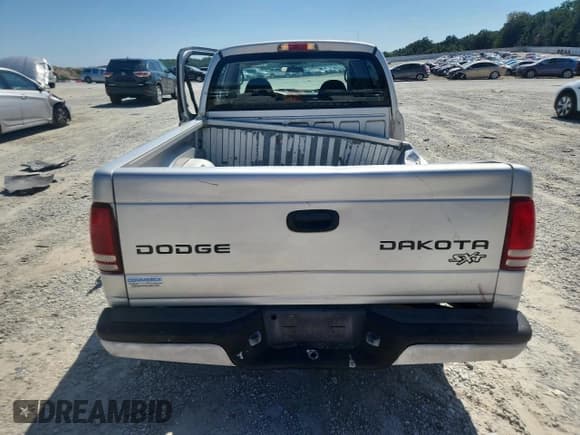 ✅ 2003 Dodge Dakota Sport • VIN: 1D7HL38X23S228612 • Lot: 80368195. Wystawiony na Copart z przebiegiem Nie podano. Bezpłatny archiwum sprzedaży aukcyjnych z USA i szczegółowy raport historii pojazdu na DreamBid. Zdjęcie 6.