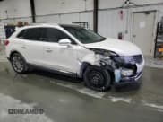 ✅ 2016 Lincoln MKX Reserve • VIN: 2LMPJ8LR3GBL49909 • Lot: 90321165. Listed on Copart with 91,418 mi. Free auction sales archive from the USA and detailed vehicle history report at DreamBid. Image 4.