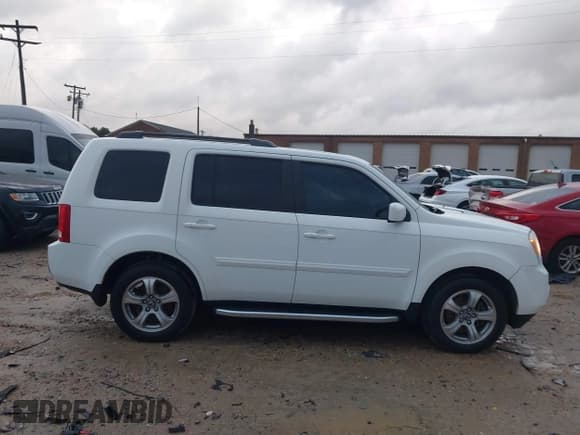 ✅ 2014 Honda Pilot EX-L • VIN: 5FNYF4H53EB049131 • Lot: 43515743. Listed on IAAI with 124,109 mi. Free auction sales archive from the USA and detailed vehicle history report at DreamBid. Image 13.