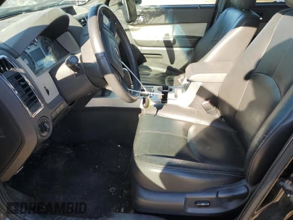 ✅ 2009 Mercury Mariner Premier • VIN: 4M2CU97719KJ08051 • Lot: 93027655. Wystawiony na Copart z przebiegiem 98 229 mil. Bezpłatny archiwum sprzedaży aukcyjnych z USA i szczegółowy raport historii pojazdu na DreamBid. Zdjęcie 7.