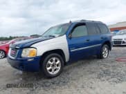 ✅ 2006 GMC Envoy SLE • VIN: 1GKDT13S362300659 • Lot: 42376597. Listed on IAAI with 261,316 mi. Free auction sales archive from the USA and detailed vehicle history report at DreamBid. Image 2.