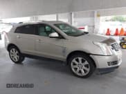 ✅ 2014 Cadillac SRX Performance Collection • VIN: 3GYFNCE33ES643534 • Lot: 42895333. Wystawiony na IAAI z przebiegiem 90 716 mil. Bezpłatny archiwum sprzedaży aukcyjnych z USA i szczegółowy raport historii pojazdu na DreamBid. Zdjęcie 13.