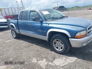 ✅ 2002 Dodge Dakota SLT • VIN: 1B7HL48XX2S668382 • Лот: 42203326. Опубликован ранее на IAAI с пробегом Не указан. Бесплатный доступ к архиву аукционных продаж из США и подробный отчёт об истории автомобиля на DreamBid. Изображение 1.