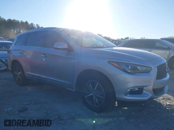✅ 2020 Infiniti QX60 Luxe • VIN: 5N1DL0MN2LC546831 • Lot: 41232325. Listed on IAAI with 49,858 mi. Free auction sales archive from the USA and detailed vehicle history report at DreamBid. Image 13.