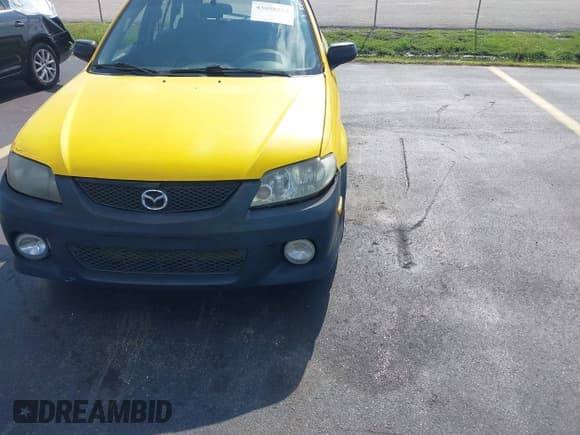 ✅ 2002 Mazda Protege • VIN: JM1BJ245321542536 • Lot: 43058514. Listed on IAAI with 170,774 mi. Free auction sales archive from the USA and detailed vehicle history report at DreamBid. Image 6.