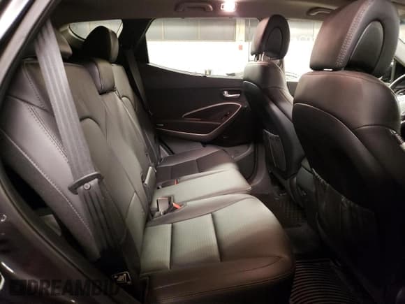 ✅ 2016 Hyundai Santa Fe • VIN: 5XYZWDLA1GG324905 • Лот: 65098742. Опубликован ранее на Copart с пробегом 4 838 миль. Бесплатный доступ к архиву аукционных продаж из США и подробный отчёт об истории автомобиля на DreamBid. Изображение 6.