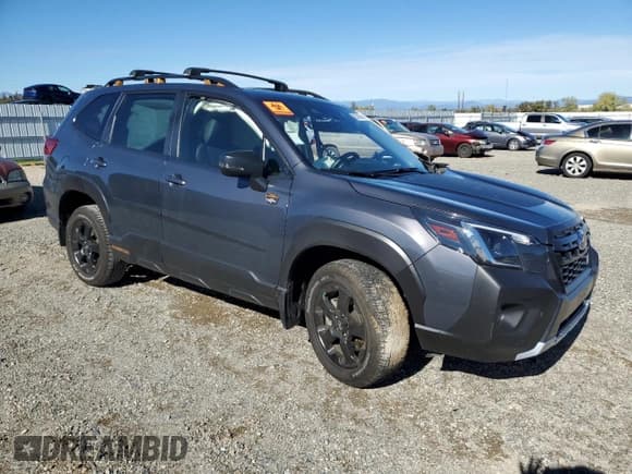 ✅ 2022 Subaru Forester Wilderness • VIN: JF2SKAMC3NH484527 • Lot: 85209565. Listed on Copart with 30,227 mi. Free auction sales archive from the USA and detailed vehicle history report at DreamBid. Image 4.