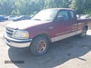 ✅ 1998 Ford F-150 • VIN: 1FTZX1723WNA62178 • Lot: 42501577. Listed on IAAI with 143,086 mi. Free auction sales archive from the USA and detailed vehicle history report at DreamBid. Image 2.