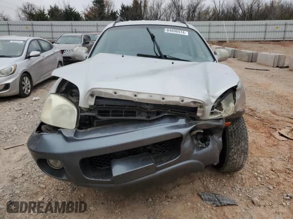 2005 Hyundai Santa Fe GLS z VIN KM8SC13D35U906966, wystawiony jako Copart lot #84896974 z przebiegiem Nie podano mil oraz Szkoda całkowita • Salvage title. Historia ofert i sprzedaży dostępna na DreamBid. Obrazek 5.