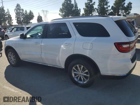 ✅ 2018 Dodge Durango SXT • VIN: 1C4RDJAG5JC483062 • Лот: 90942785. Опубликован ранее на Copart с пробегом 230 599 миль. Бесплатный доступ к архиву аукционных продаж из США и подробный отчёт об истории автомобиля на DreamBid. Изображение 2.