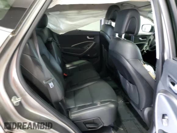 ✅ 2014 Hyundai Santa Fe • VIN: 5XYZU3LA6EG207690 • Лот: 63659934. Опубликован ранее на Copart с пробегом 76 843 миль. Бесплатный доступ к архиву аукционных продаж из США и подробный отчёт об истории автомобиля на DreamBid. Изображение 12.