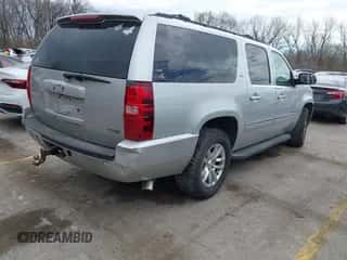 2011 Chevrolet Suburban LTZ z VIN 1GNSKKE35BR290484, wystawiony jako IAAI lot #41897265 z przebiegiem 223 739 mil mil oraz . Historia ofert i sprzedaży dostępna na DreamBid. Obrazek 4.
